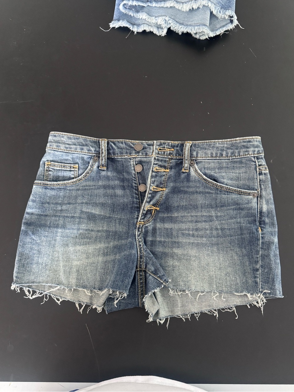 Denim Cutoff Shorts in Faded Blue